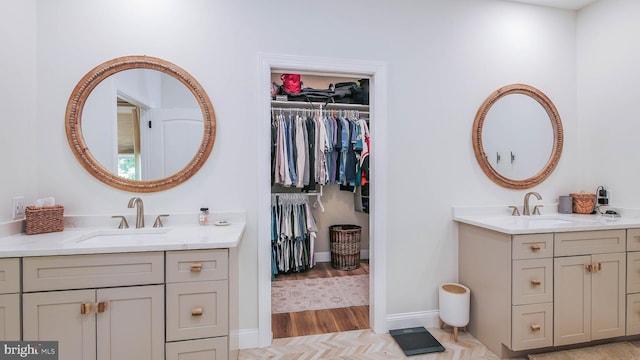 bathroom featuring vanity and hardwood / wood-style floors