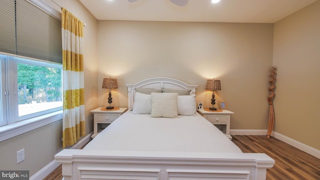 bedroom featuring dark wood-type flooring