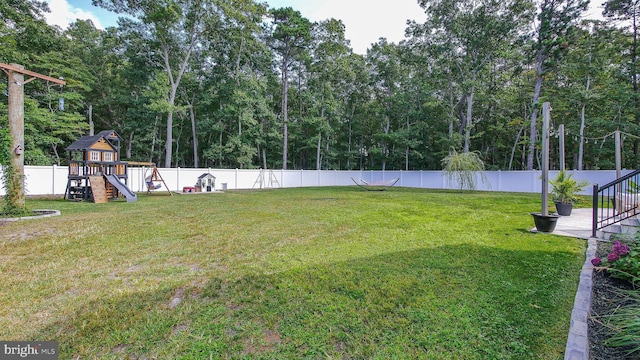 view of yard featuring a playground