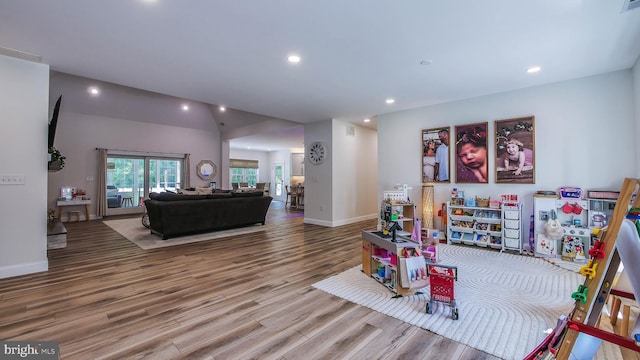 game room with hardwood / wood-style floors