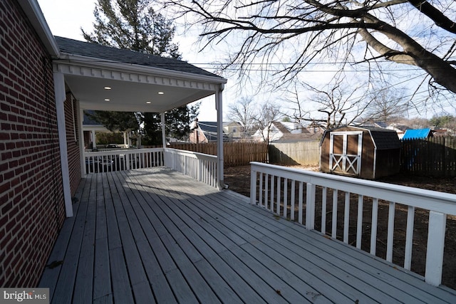 deck featuring a storage shed