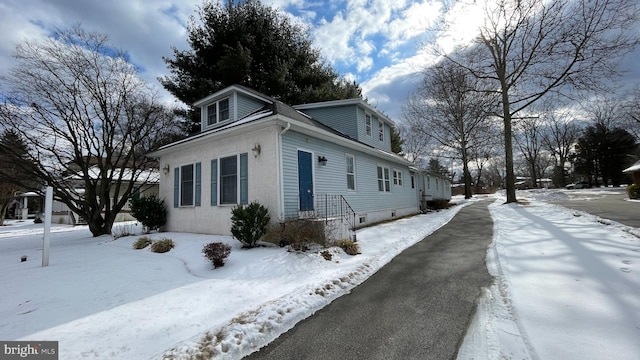 view of snow covered property