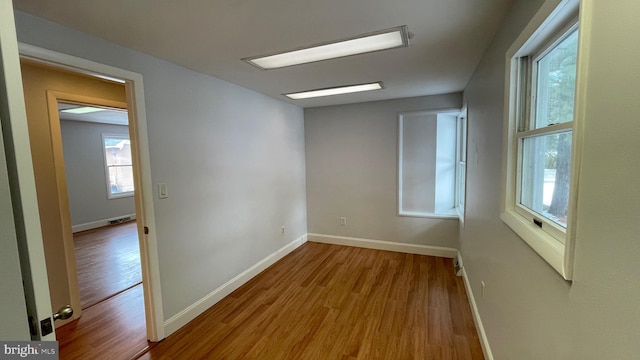 unfurnished room featuring light hardwood / wood-style flooring