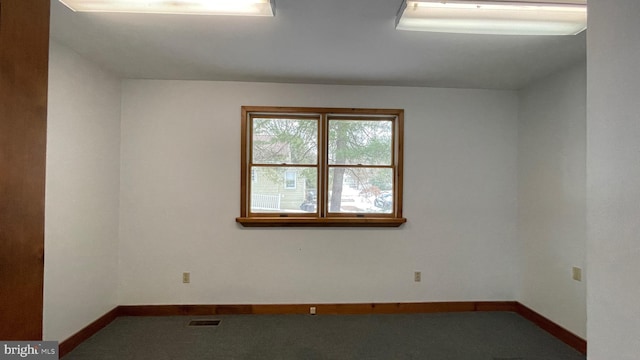 empty room featuring carpet