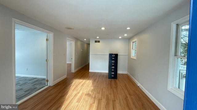 basement featuring light wood-type flooring