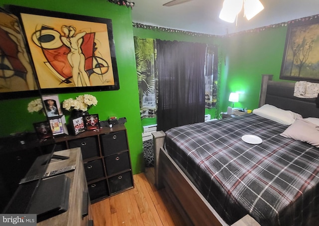 bedroom with light hardwood / wood-style flooring