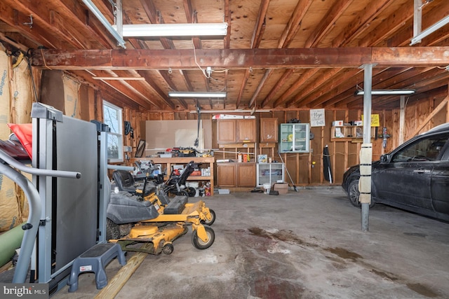 garage with a workshop area