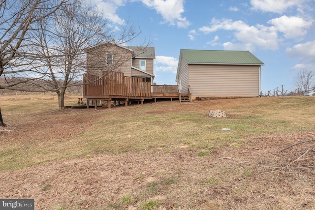 view of yard with a wooden deck