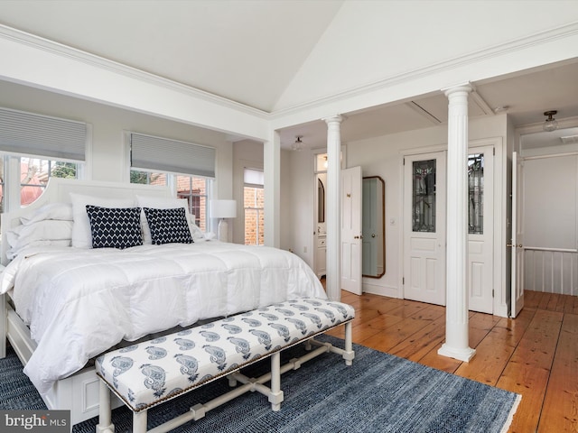 143 Market St, Annapolis, MD 21401 - bedroom featuring ornate columns, vaulted ceiling, and hardwood / wood-style flooring