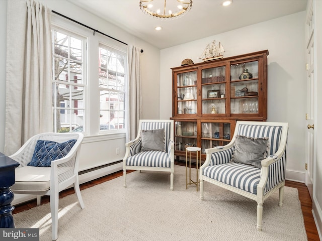 143 Market St, Annapolis, MD 21401 - sitting room featuring a notable chandelier and wood-type flooring