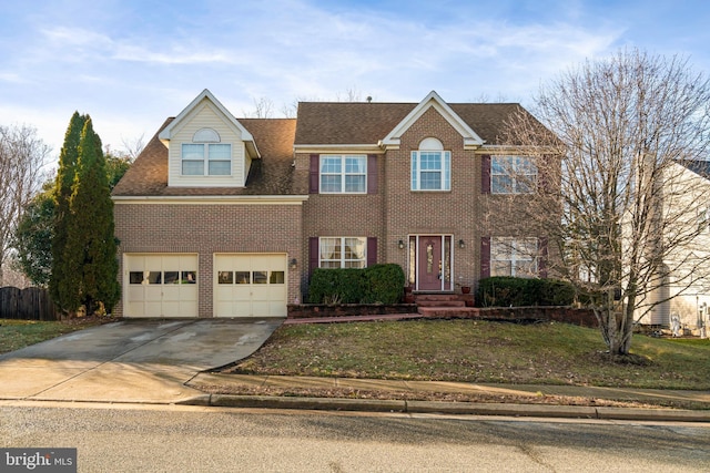 view of front facade featuring a garage and a front lawn