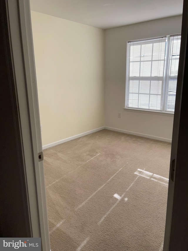 empty room with light carpet