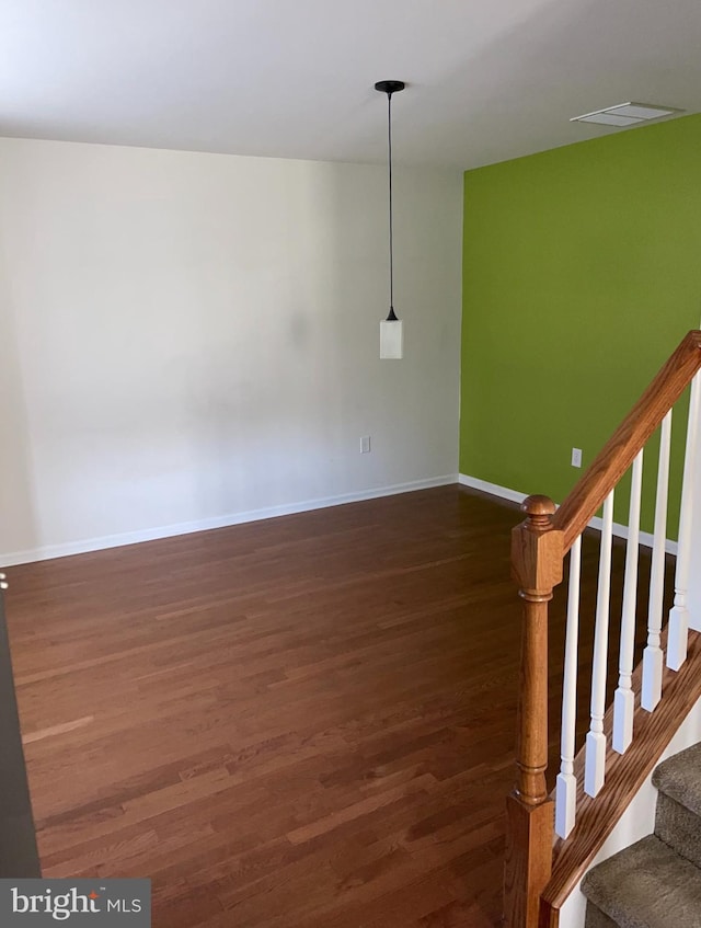 interior space with dark hardwood / wood-style flooring