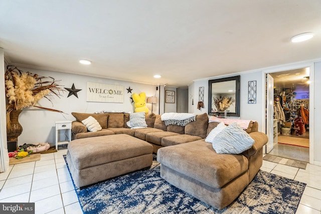 tiled living room featuring crown molding