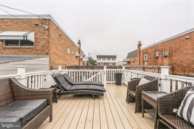 deck with an AC wall unit