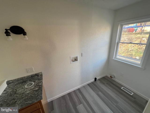 laundry room with hookup for a washing machine and wood-type flooring