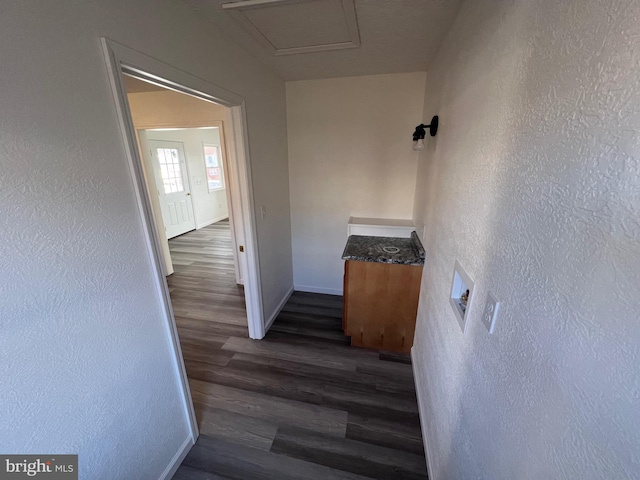 hallway featuring dark hardwood / wood-style floors