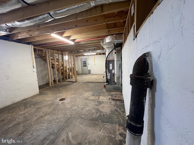 basement featuring heating unit