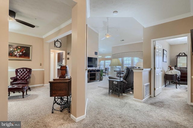 hall with ornamental molding, vaulted ceiling, and light carpet