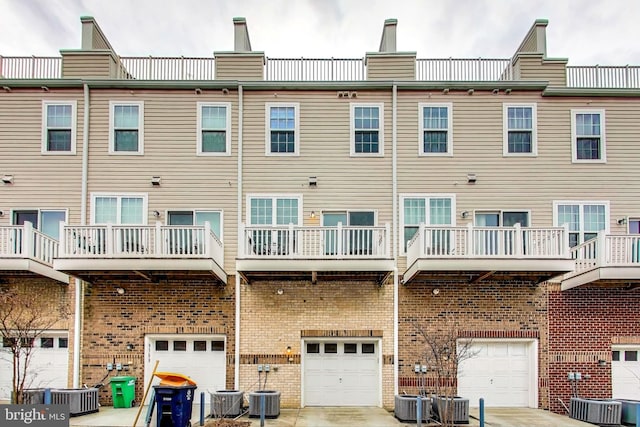 back of property with central AC unit