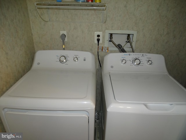 laundry area featuring independent washer and dryer