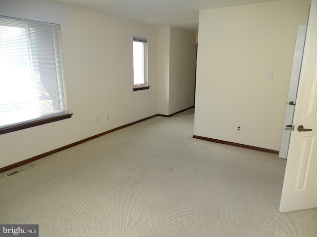 view of carpeted spare room