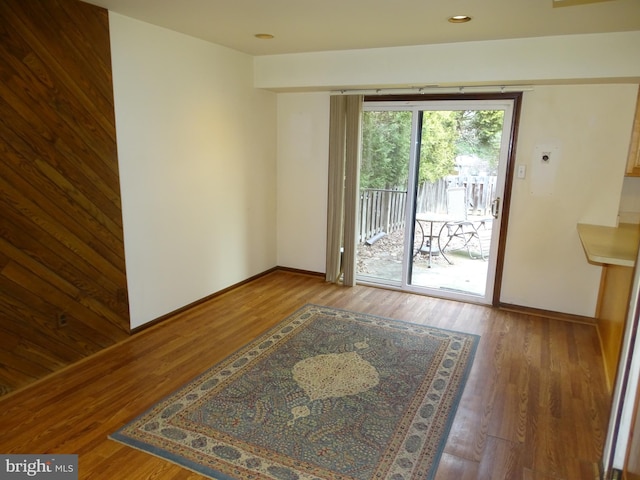 doorway to outside featuring wood-type flooring