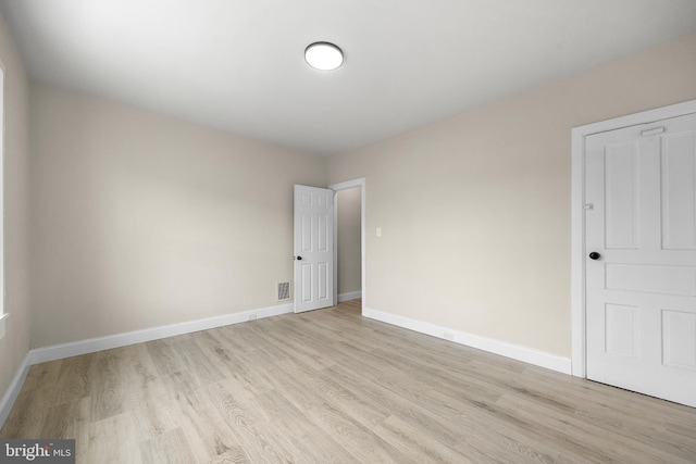 empty room featuring light wood-type flooring