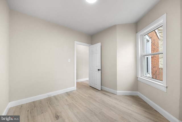 unfurnished bedroom featuring light hardwood / wood-style floors