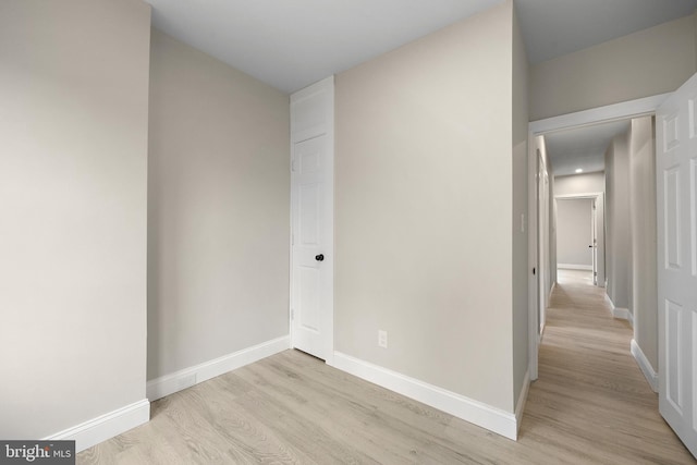 spare room with light hardwood / wood-style floors