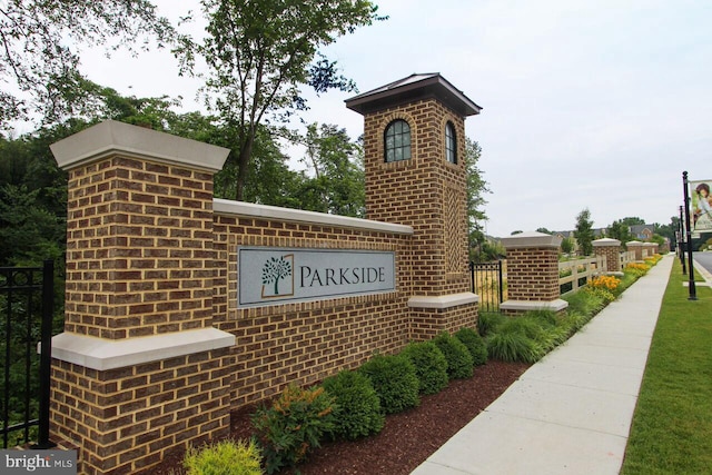 view of community sign