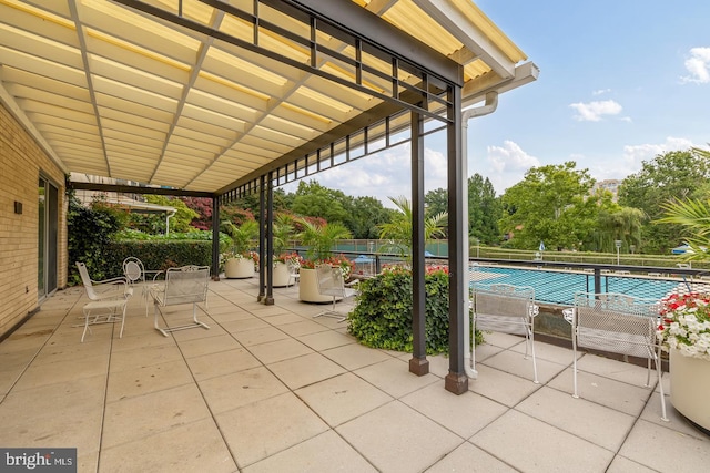 view of patio with a community pool