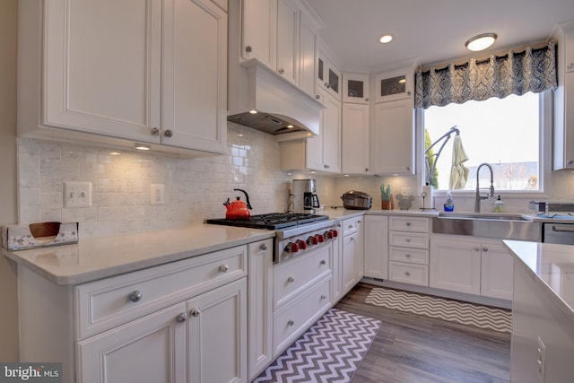 kitchen with light stone countertops and white cabinets