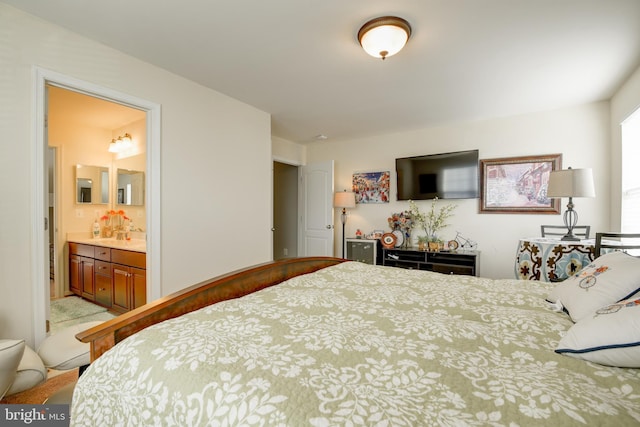 bedroom featuring ensuite bathroom