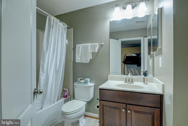 full bathroom with vanity, tile patterned floors, toilet, and shower / bath combo