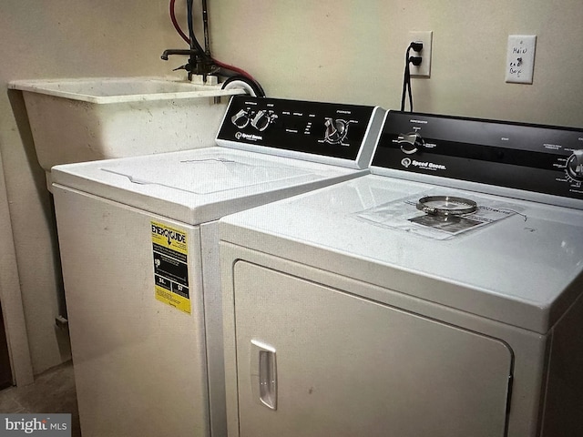 washroom featuring washer and dryer