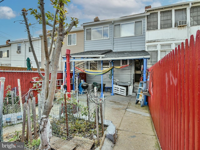 back of house featuring a patio area