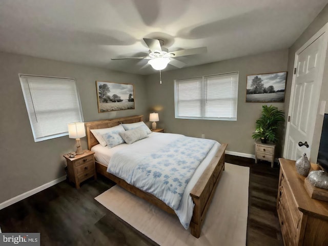 bedroom featuring dark hardwood / wood-style floors and ceiling fan