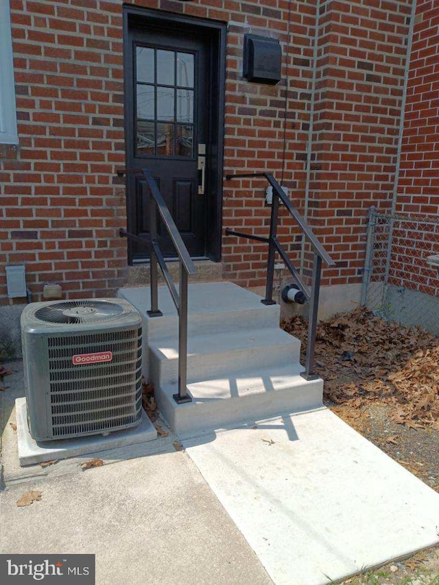 entrance to property with central AC unit