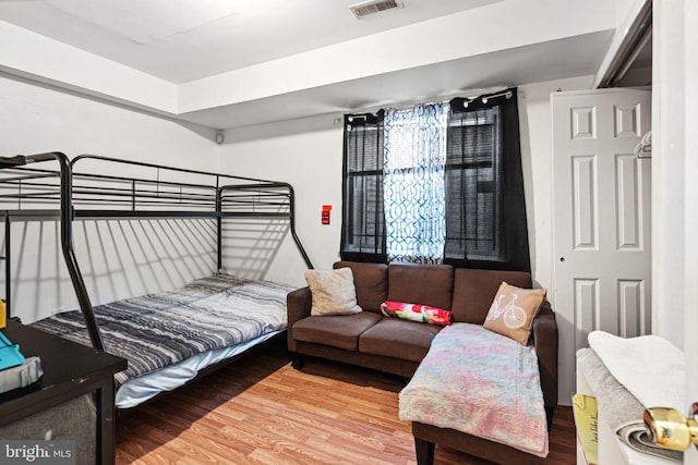 bedroom featuring hardwood / wood-style floors