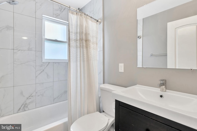 full bathroom featuring vanity, shower / bath combination with curtain, and toilet