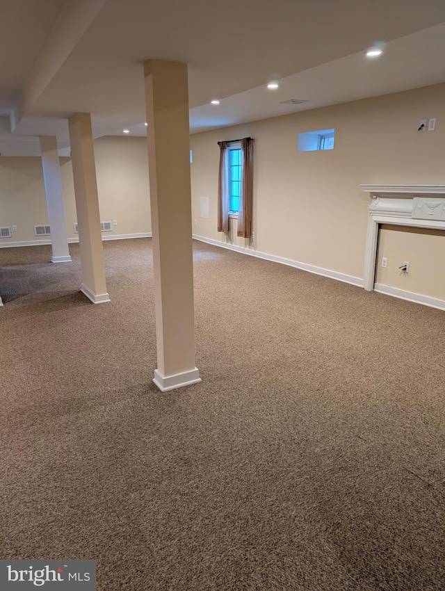 basement with carpet flooring