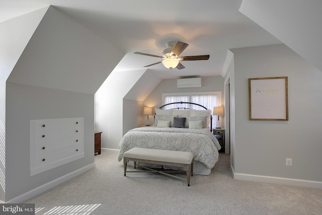 bedroom with a wall unit AC, baseboards, and carpet floors