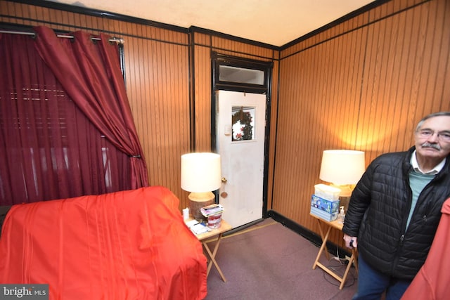 carpeted bedroom with crown molding