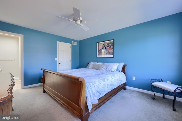 bedroom featuring ceiling fan and light colored carpet