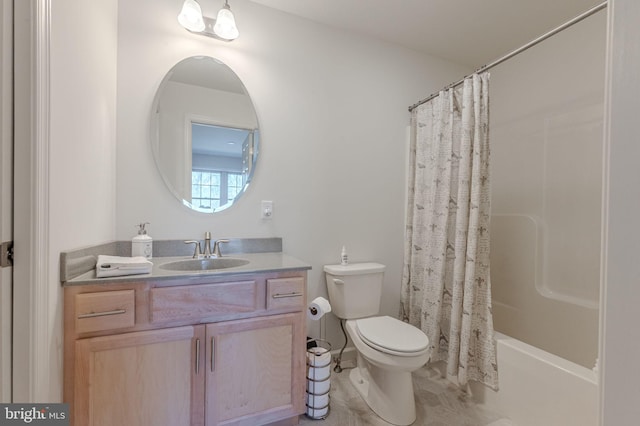 bathroom with vanity, toilet, and shower / bath combo