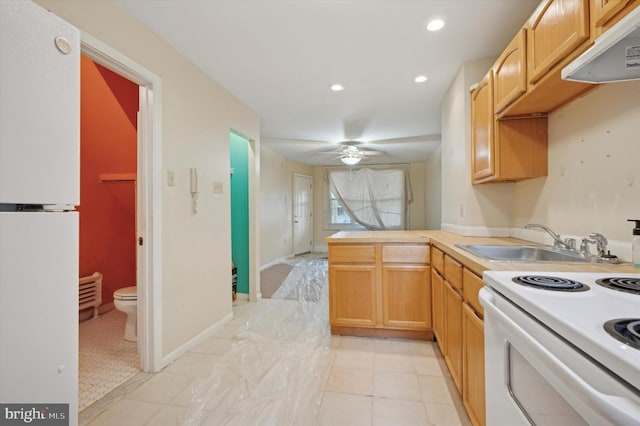 kitchen featuring extractor fan, sink, light brown cabinets, ceiling fan, and white range with electric stovetop