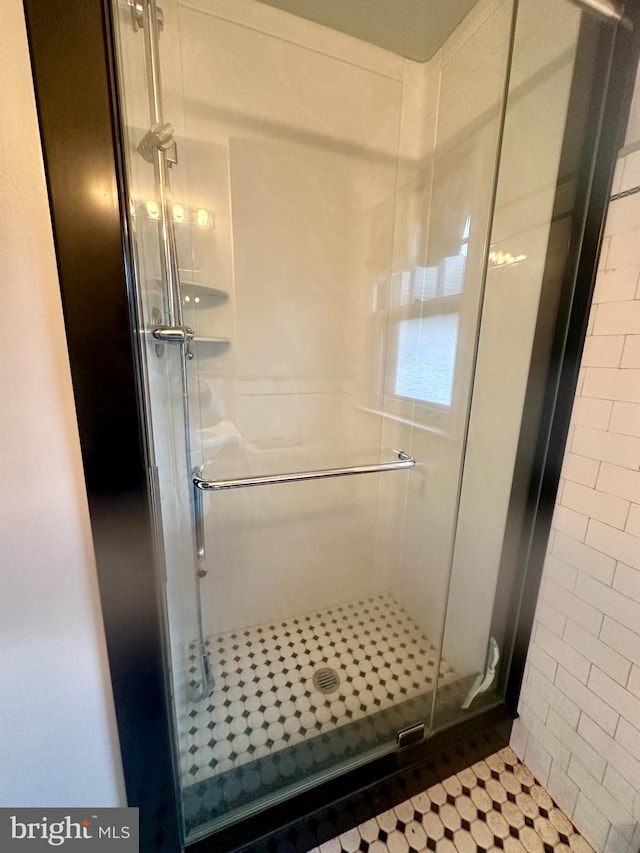 bathroom featuring walk in shower