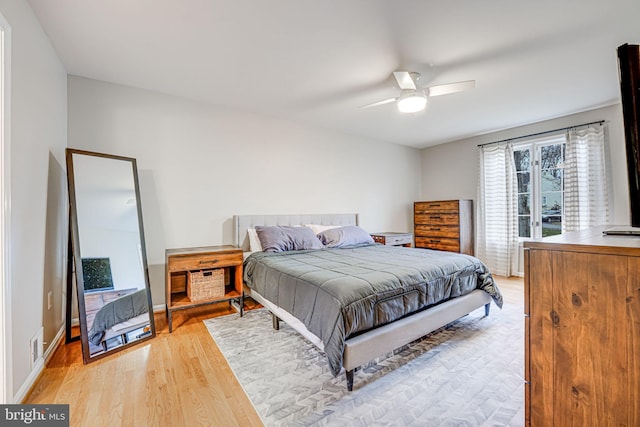 bedroom featuring ceiling fan and light wood-type flooring