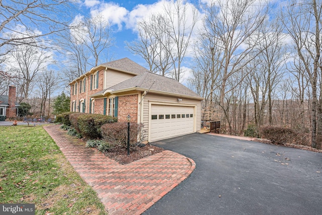 view of home's exterior with a garage